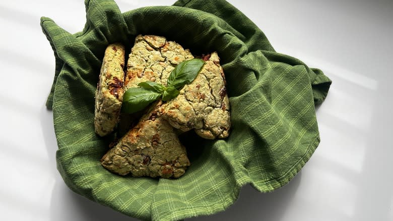 greenish-brown scones in a green napkin