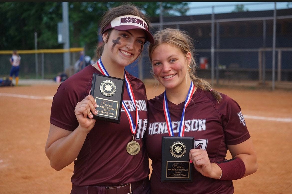 Henderson County senior Taylor Troutman (left) and junior Anna Kemp (right).