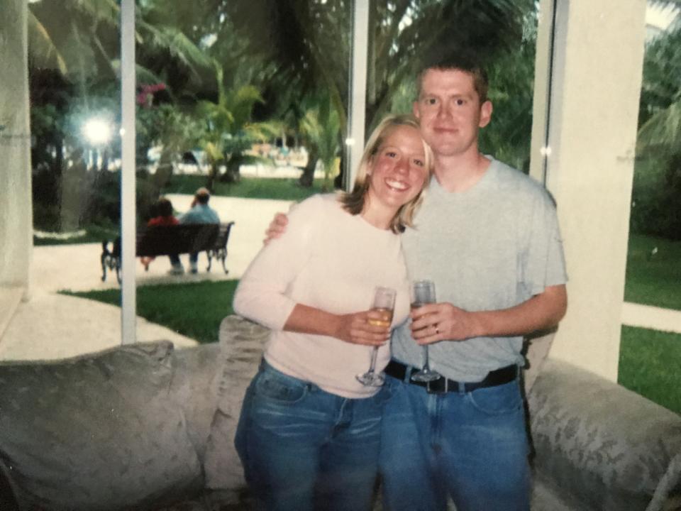 Champagne toast at check-in for the newlyweds, 2003