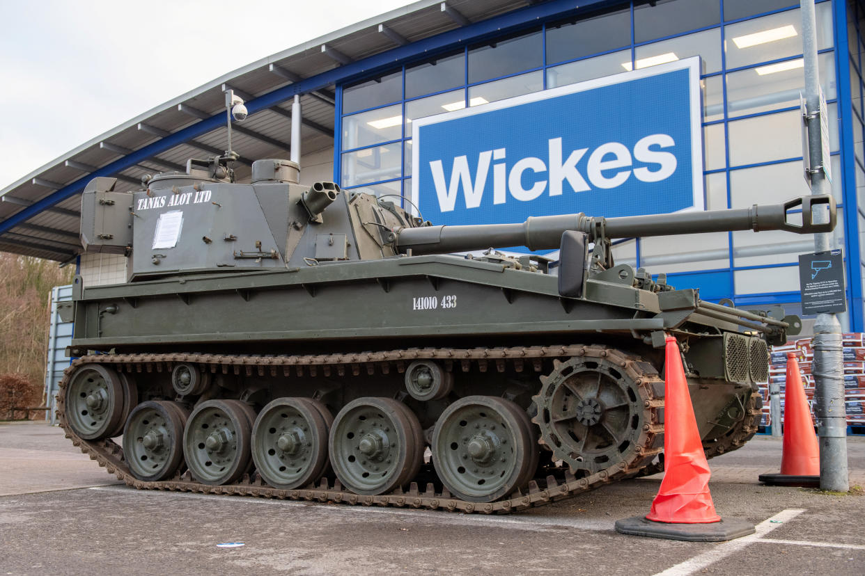 Tank parked outside of Wickes in Basingstoke, to protest against a customer's 'poor quality' kitchen fit, has now had a 14 day removal notice placed on to it. Basingstoke. January 30 2024. See SWNS story SWLStank.A man who parked a tank outside a Wickes in protest over a kitchen has been told it will be removed in 14 days - but says he's not budging.Paul Gibbons, 63, drove the vehicle to the Basingstoke store in a row over some work.Fed-up Paul has demanded a refund from Wickes for his â€œpoor qualityâ€ Â£25,000 kitchen installation at his home last February.He says it has been plagued with issues including mould under the sink, badly fitting units with a poor finish and one heavy drawer nearly collapsing on his dog.
