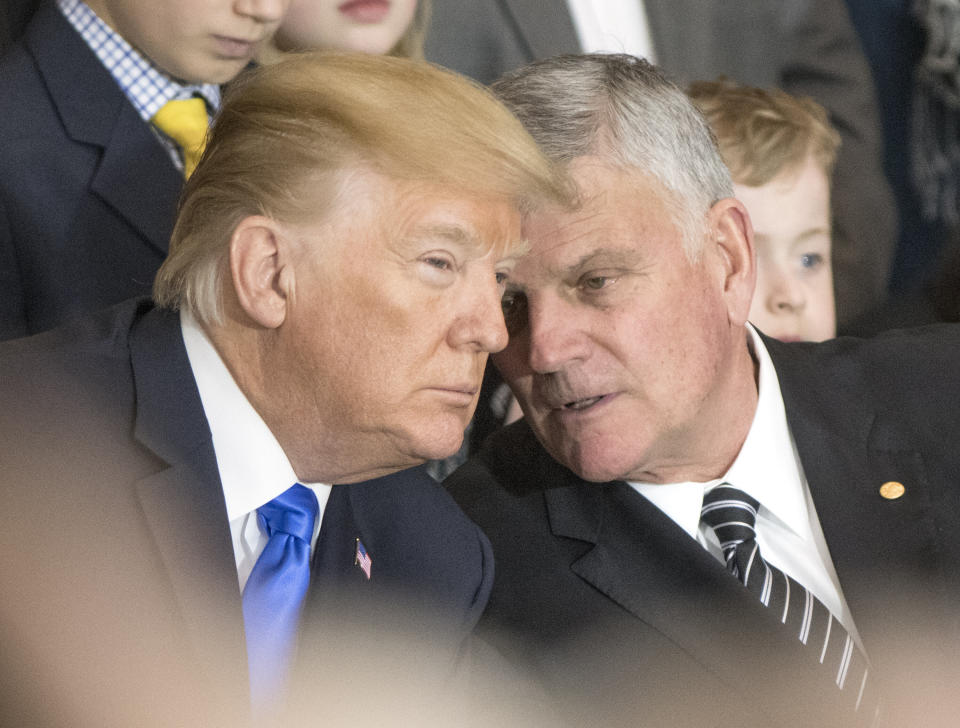 Franklin Graham talks with President Donald Trump at a memorial service for Graham's father, the late evangelist Billy Graham, at the U.S. Capitol, on Feb. 28, 2018, in Washington. (Photo: Pool via Getty Images)