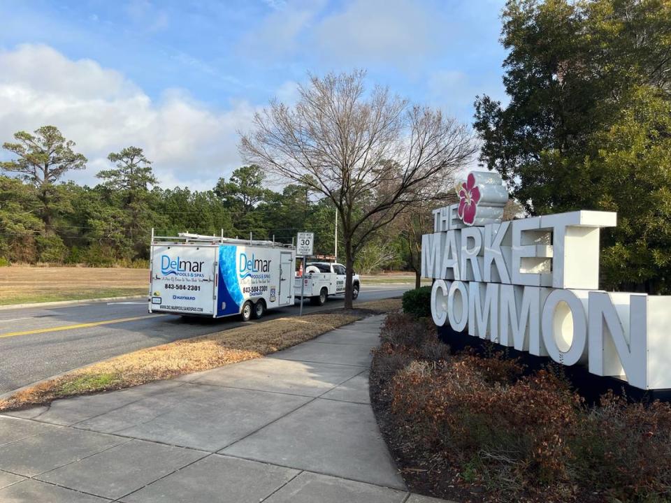 A pool maintenance vehicle drives past the Market Common’s Farrow Parkway entrance Jan. 4, 2023. The intersection could see up to 200 homes built.