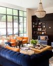 <p>Black provides an interesting counterpoint to the rich hues of blue and orange in this room from <a href="https://deringhall.com/interior-designers/sara-gilbane-interiors" rel="nofollow noopener" target="_blank" data-ylk="slk:Sara Gilbane Interiors;elm:context_link;itc:0;sec:content-canvas" class="link ">Sara Gilbane Interiors</a>.</p>