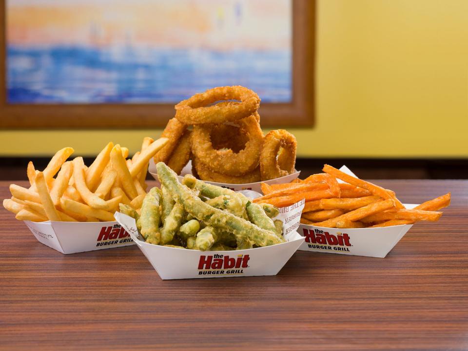 The Habit Burger Grill offers french fries and onion rings as sides to its flame-grilled burgers, as well as tempura battered green beans and sweet potato fries.