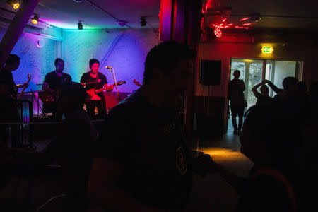 A band plays music during a late night dance in the town of Tasiilaq, Greenland, June 17, 2018. REUTERS/Lucas Jackson