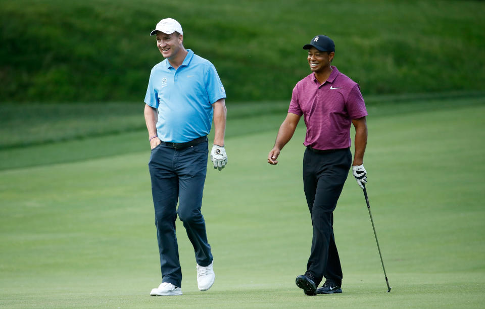 Peyton Manning and Tiger Woods in 2018. (Photo by Andy Lyons/Getty Images)