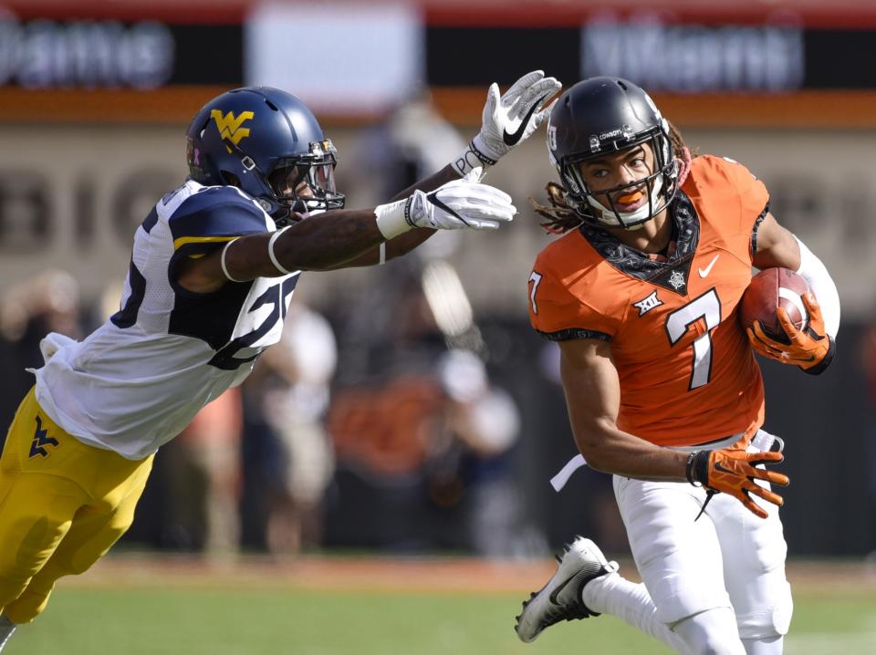 Oklahoma State knocked West Virginia from the ranks of the unbeaten. And the top 10. (Getty)