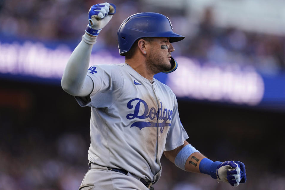 Los Angeles Dodgers' Miguel Rojas gestures after hitting an RBI single against the San Francisco Giants during the 10th inning of a baseball game Saturday, June 29, 2024, in San Francisco. (AP Photo/Godofredo A. Vásquez)