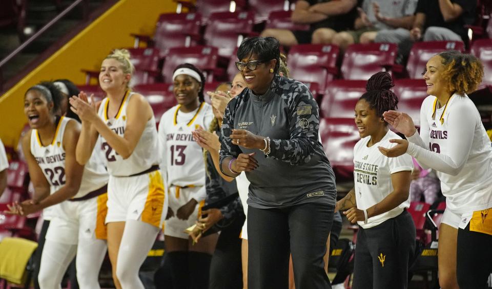 ASU head coach Natasha Adair (R) reacts with her bench after a forced turnover against Montana State during a game at Desert Financial Arena in Tempe on Nov. 10, 2023.