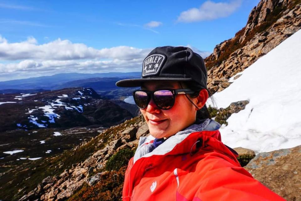 Sue en route to the peak of Cradle Mountain, Tasmania. PHOTO: Sue Tham