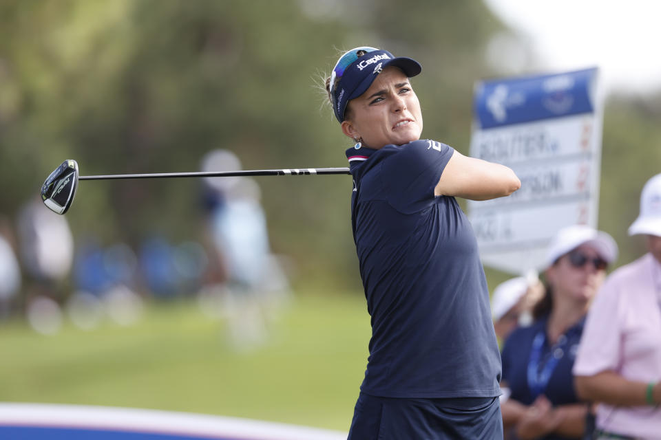 Lexi Thompson watches her tee shot on the 18th hole during the first round of an LPGA golf tournament Thursday, Nov. 9, 2023, in Belleair, Fla. (AP Photo/Scott Audette)