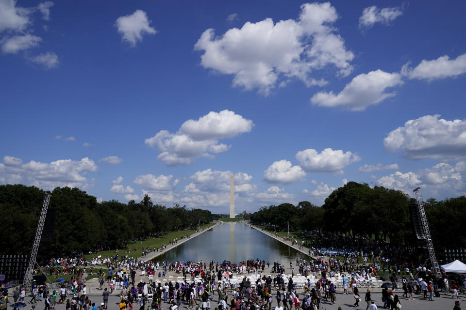 The Washington Monument is seen in the background after speakers concluded during the 60th Anniversary of the March on Washington at the Lincoln Memorial in Washington, Saturday, Aug. 26, 2023. (AP Photo/Andrew Harnik)