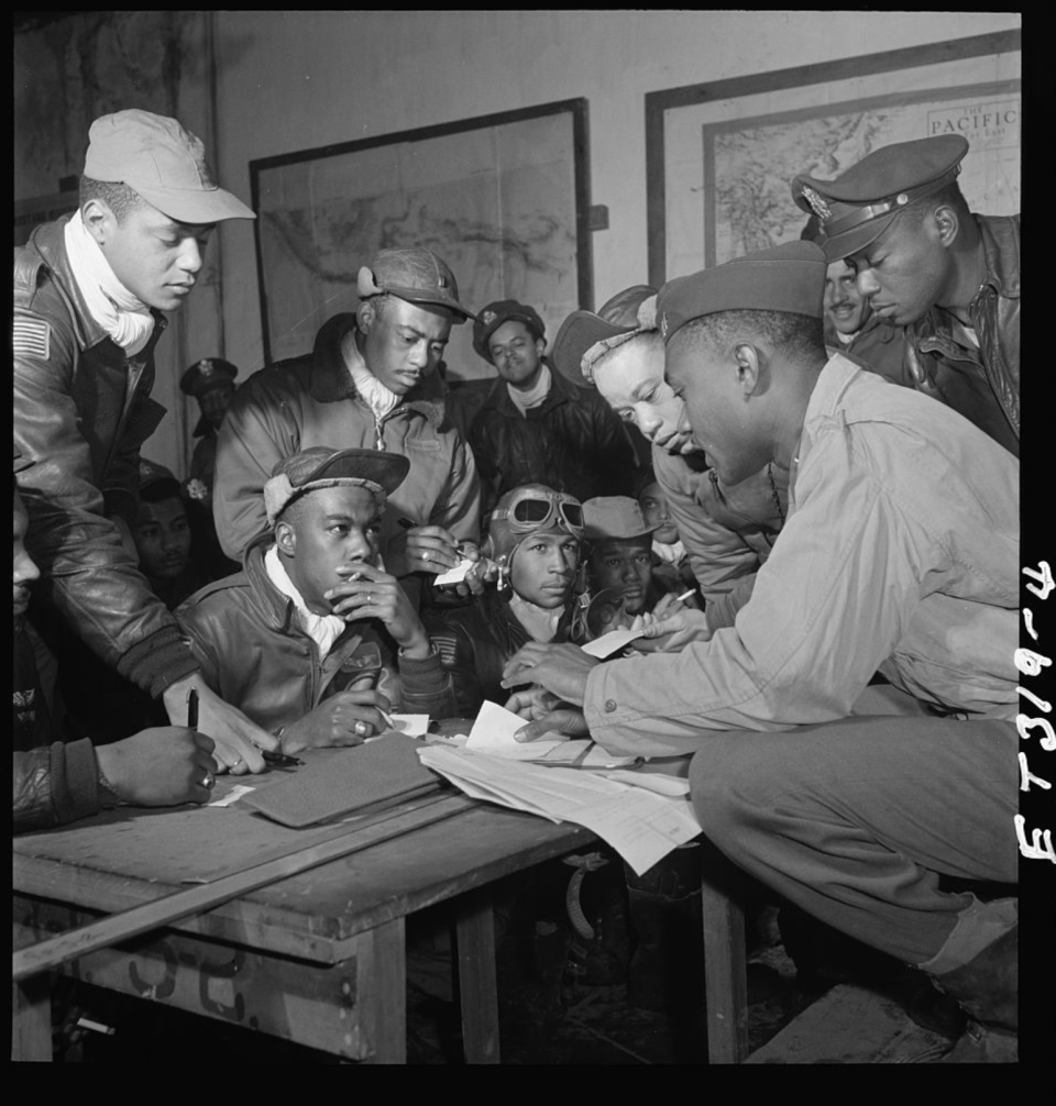 Photograph of several Tuskegee airmen at Ramitelli, Italy, March 1945.