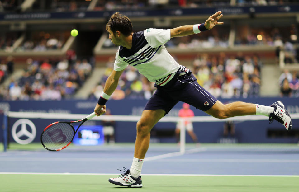 <p>Dusan Lajovic of Serbia & Montenegro returns a shot against Rafael Nadal of Spain in their Men’s Singles first round on Day Two of the 2017 US Open at the USTA Billie Jean King National Tennis Center on August 29, 2017 in the Flushing neighborhood of the Queens borough of New York City. (Photo by Elsa/Getty Images) </p>