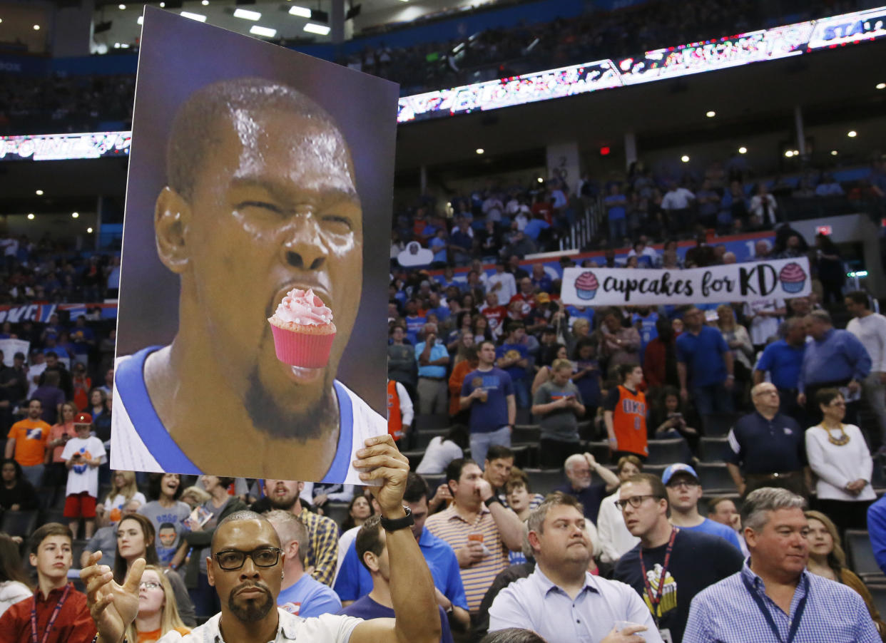 Thunder fans mocked Kevin Durant as a “cupcake” for joining the Warriors. (AP)