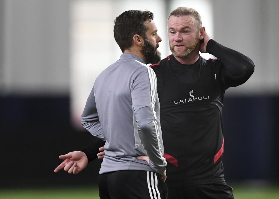 STERLING, VA - JANUARY 23:  D.C. United head coach Ben Olsen talks with forward Wayne Rooney (9) during the team's media day practice at The St. James on Wednesday, January 23, 2019.  (Photo by Toni L. Sandys/The Washington Post via Getty Images)