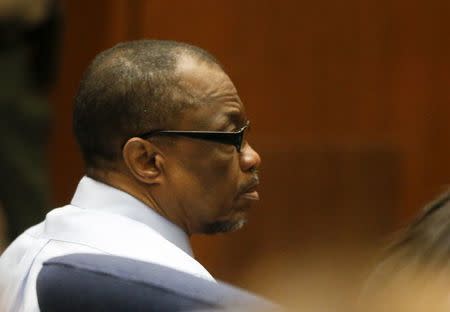 Defendant Lonnie Franklin Jr. listens while Deputy District Attorney Beth Silverman details the prosecution's case against him during closing arguments in the so-called "Grim Sleeper" case a serial murder trial in Los Angeles, California, U.S. May 2, 2016. REUTERS/Mark Boster/ Los Angeles Times/Pool