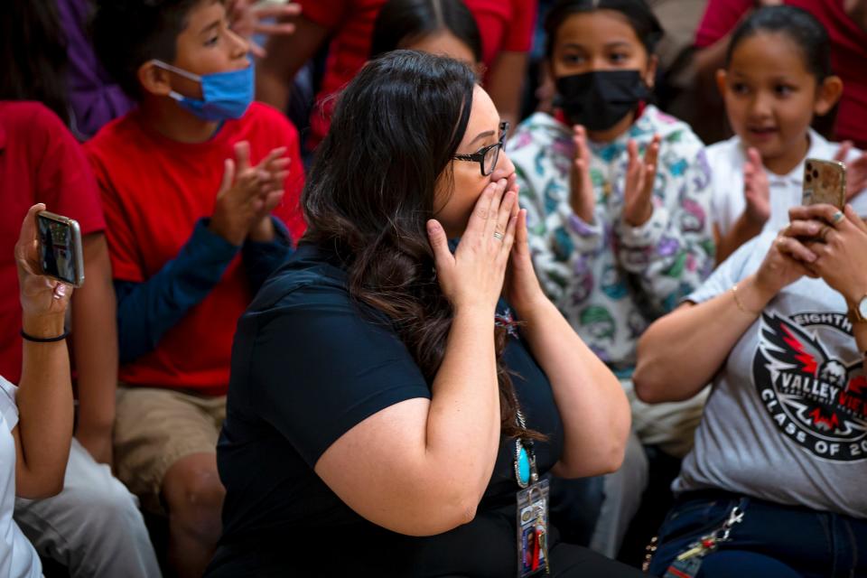 Teacher and instructional coach Jessica Zimmerman reacts to learning she was the 2022 recipient of the Milken Educator Award during an assembly held at Valley View Leadership Academy in Phoenix on May 13, 2022.