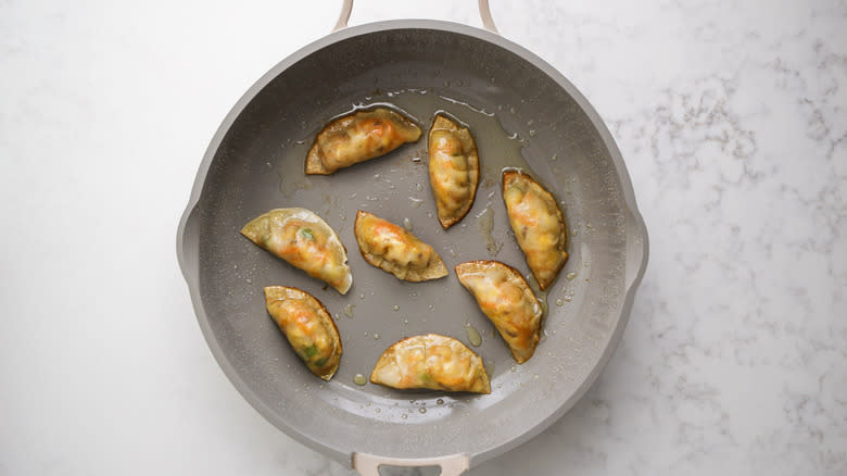 vegetable potstickers in pan