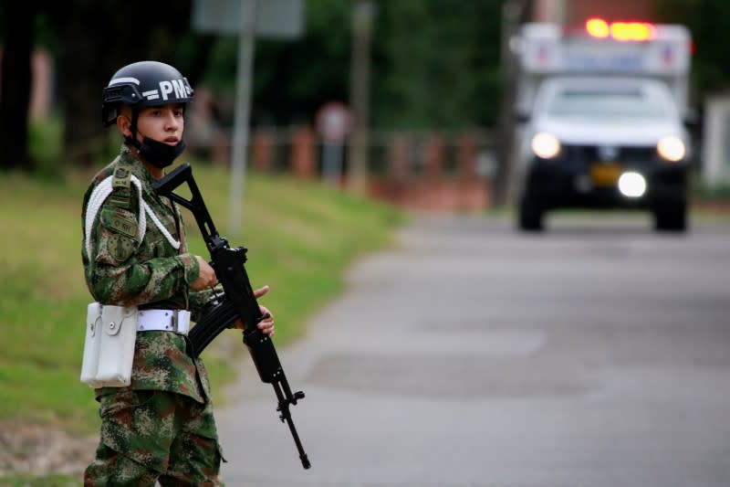 A soldier patrols around a military battalion where a car bomb exploded, according to authorities, in Cucuta