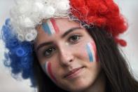 A French supporter poses ahead of the France 2019 Women's World Cup Group A football match between France and Norway, on June 12, 2019, at the Nice Stadium in Nice, southeastern France. (Photo by Christophe Simon/AFP/Getty Images)