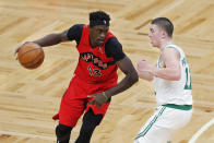 Toronto Raptors' Pascal Siakam (43) drives past Boston Celtics' Payton Pritchard (11) during the first half of an NBA basketball game, Thursday, Feb. 11, 2021, in Boston. (AP Photo/Michael Dwyer)