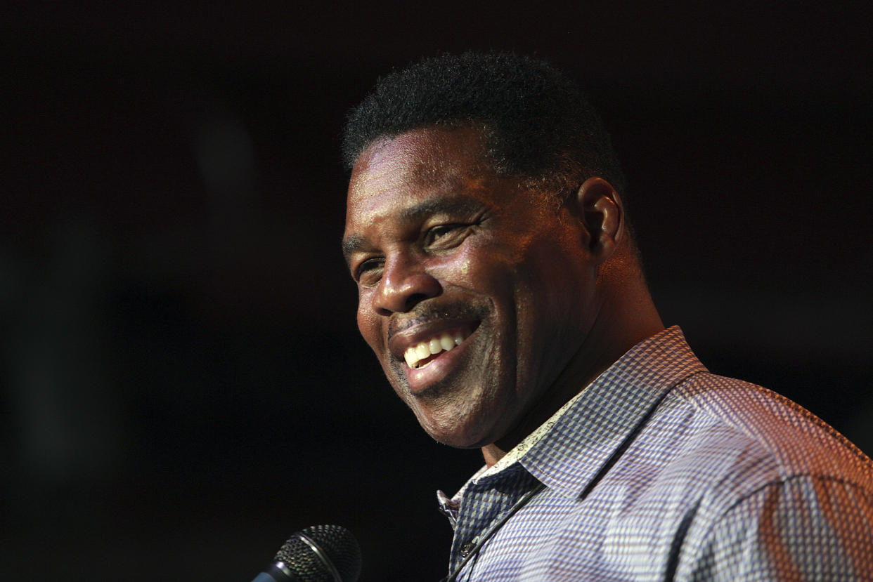 Herschel Walker, GOP candidate for the U.S. Senate for Georgia, speaks at a primary watch party, Monday, May 23, 2022, at the Foundry restaurant in Athens, Ga., near the University of Georgia where he once played football. (AP Photo/Akili-Casundria Ramsess)