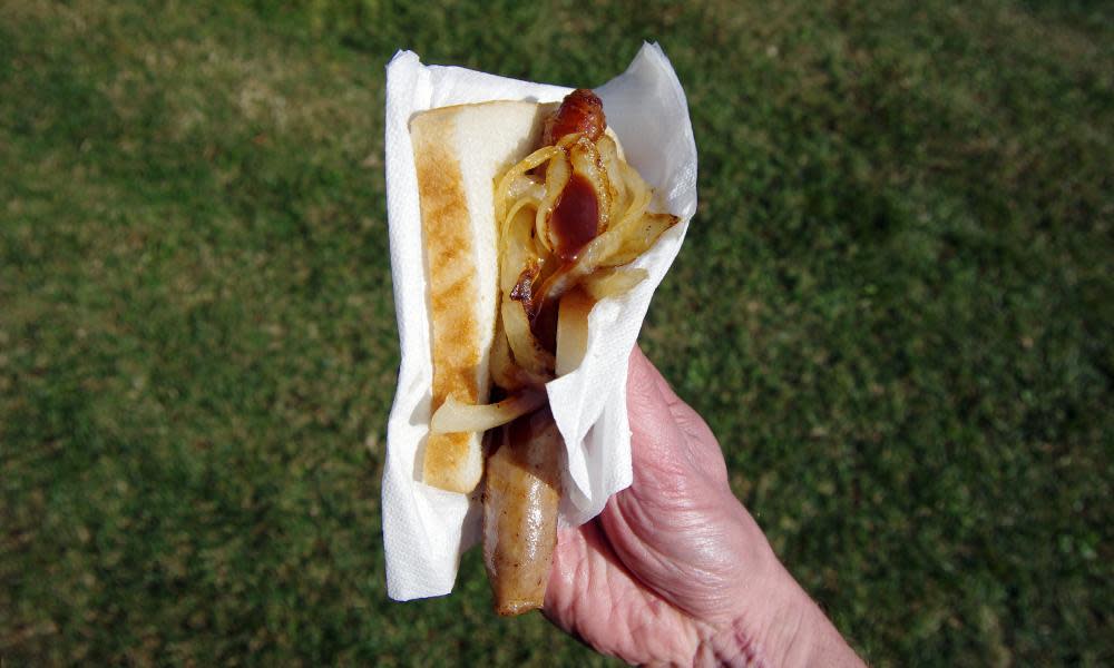 Slip hazard: placing fried onions on top of the sausage has been deemed a health and safety issue by Bunnings. 