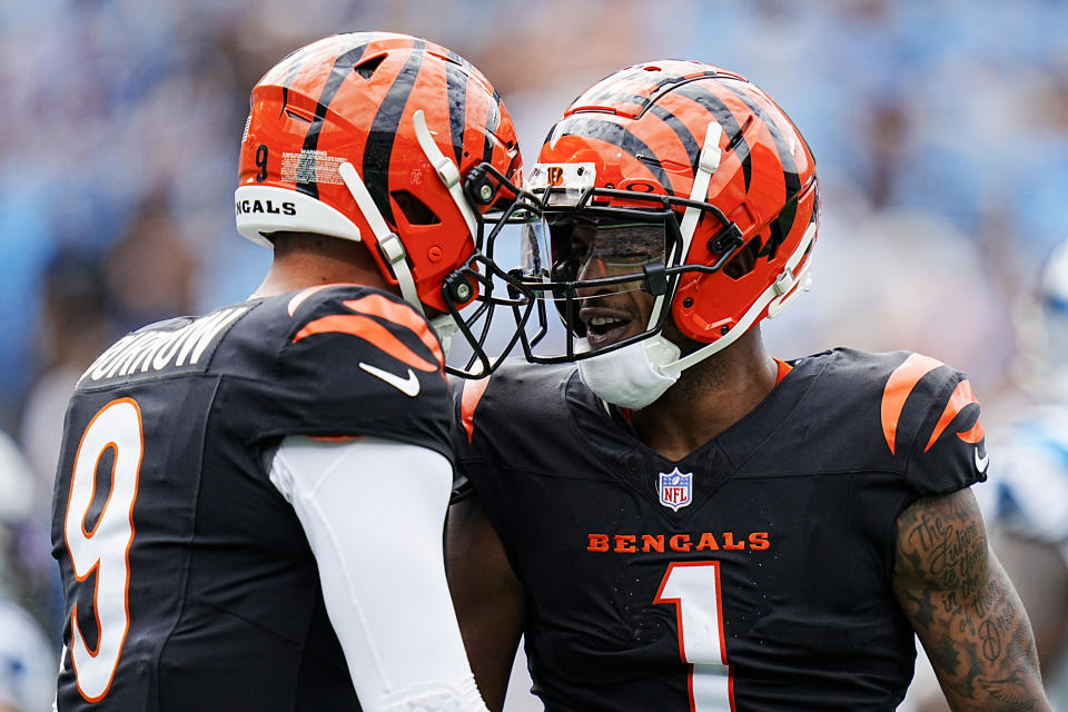 Cincinnati Bengals wide receiver Ja'Marr Chase celebrates after scoring with quarterback Joe Burrow against the Carolina Panthers during the first half of an NFL football game, Sunday, Sept. 29, 2024, in Charlotte, N.C. (AP Photo/Rusty Jones)