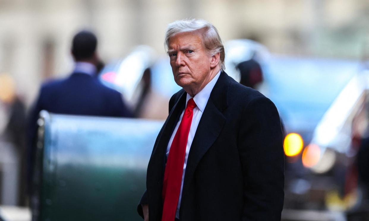 <span>Donald Trump arrives at 40 Wall Street after a court in his hush-money case in New York City last month.</span><span>Photograph: Charly Triballeau/AFP/Getty Images</span>