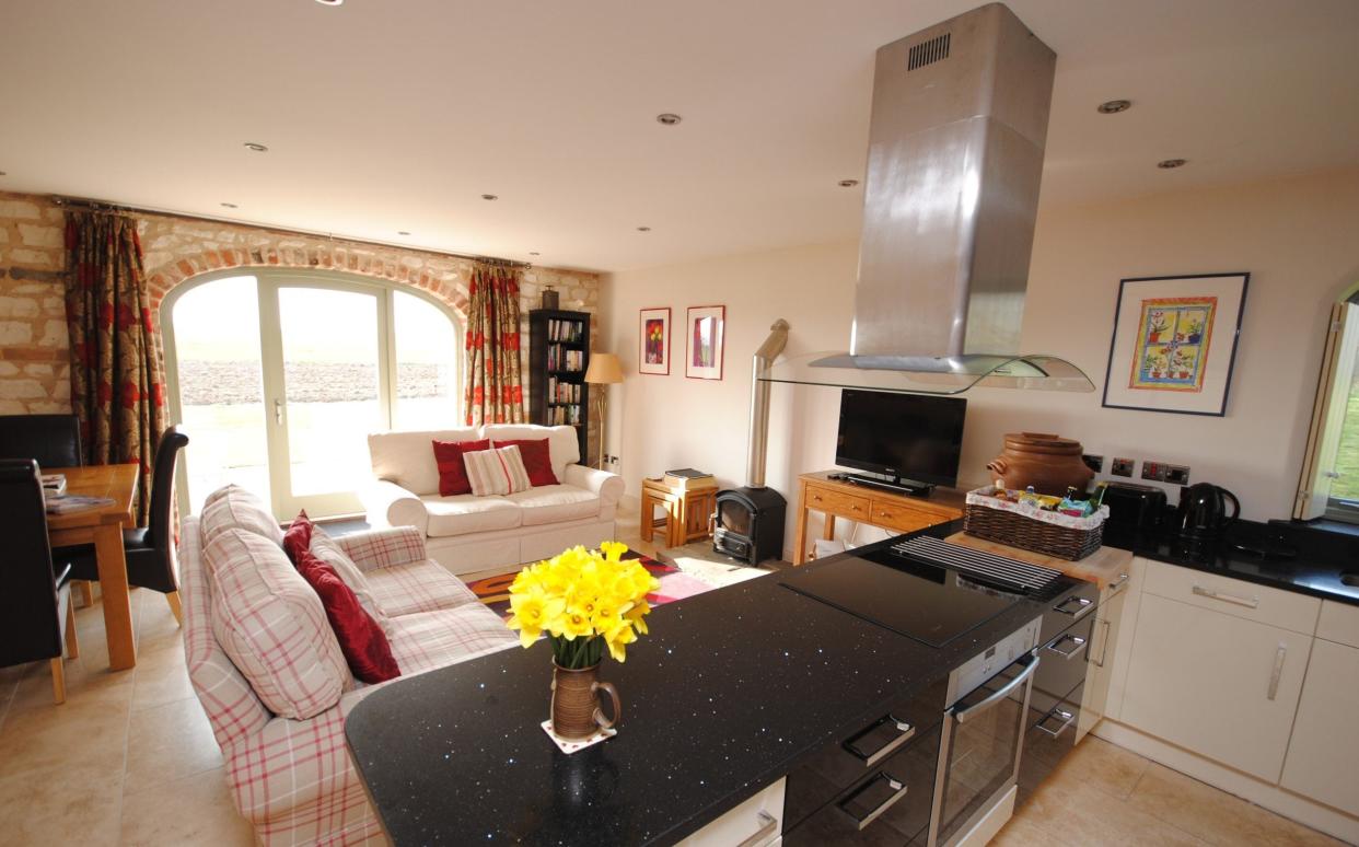 Hayloft holiday cottage sitting room dining room kitchen