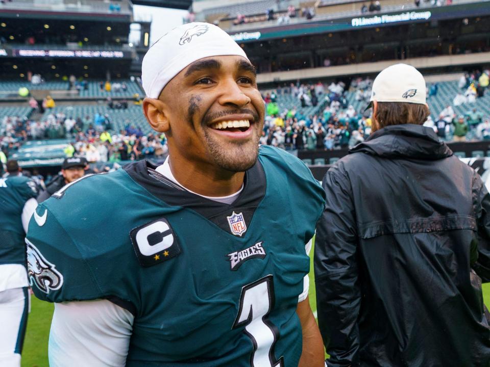 Jalen Hurts walks off the field after a win against the Jacksonville Jaguars.