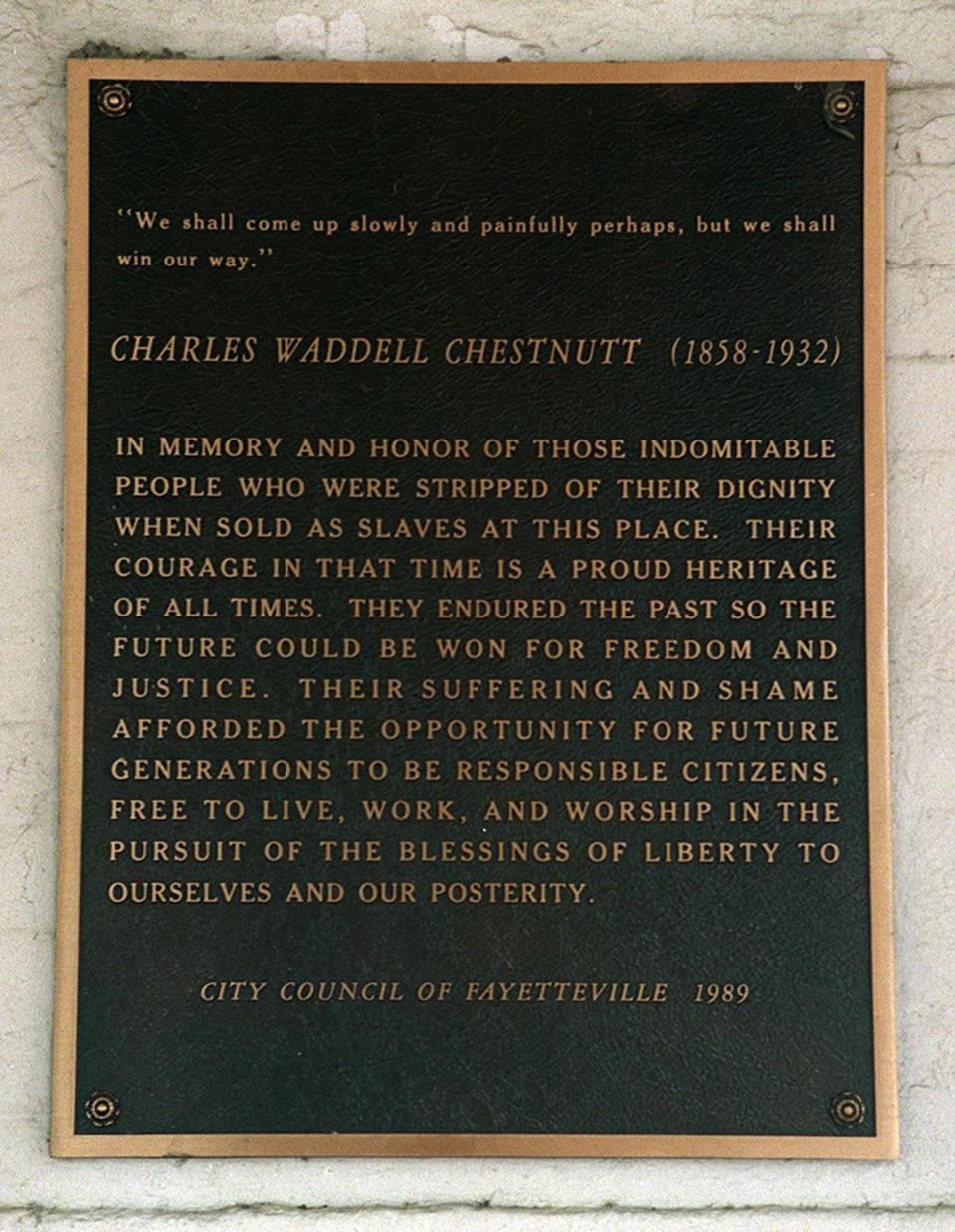 The City Council placed a plaque under the Market House in 1989 to memorialize Charles Waddell Chestnutt and others who had been sold as slaves there.