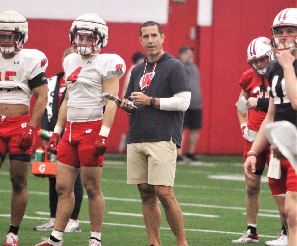 Wisconsin coach Luke Fickell watches practice earlier this month at the McClain Center in Madison. Fickell has been encouraged in practice by the "legitimate, competitive battle” between quarterbacks Tyler Van Dyke and Braedyn Locke for the starter's job.