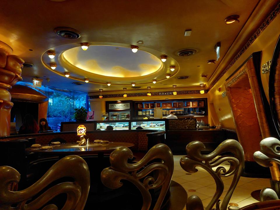 The interior of the Cheesecake Factory in Chicago on the Magnificent Mile. The photo shows empty tables