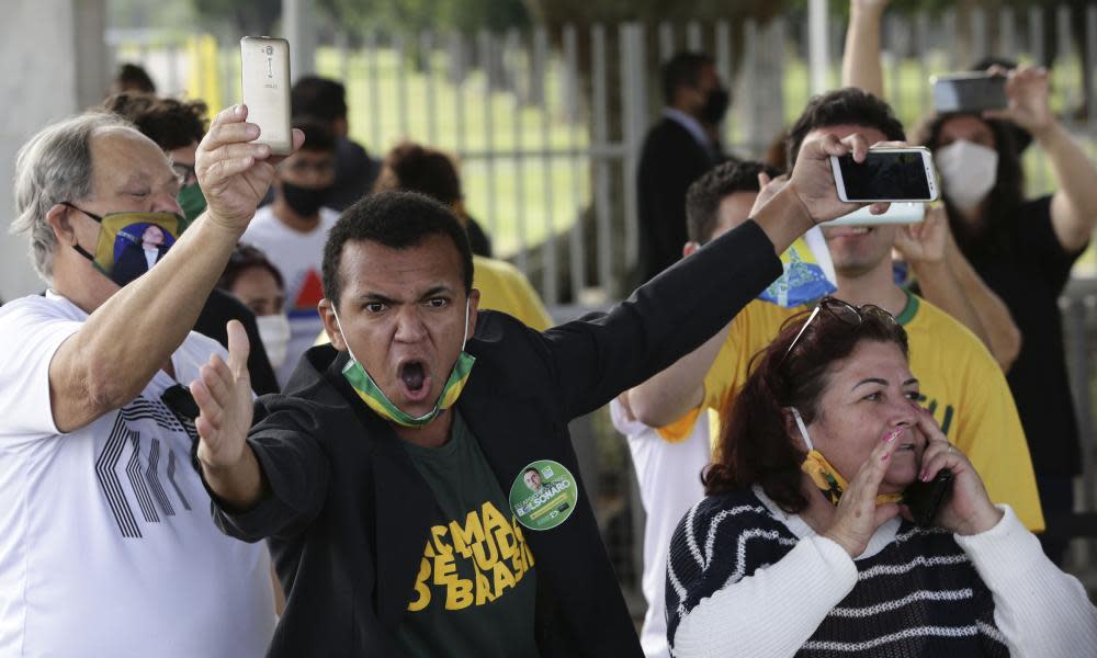 <span>Photograph: Eraldo Peres/AP</span>