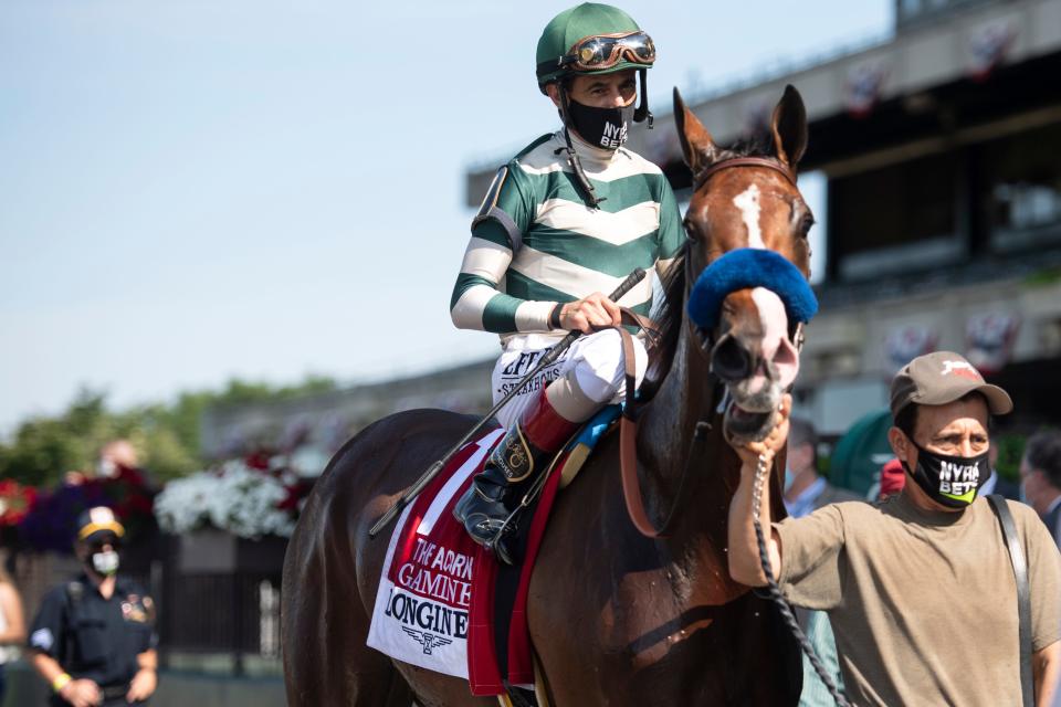 John Velazquez and Gamine after finishing first in the 8th race of the day before the 152nd running of the Belmont Stakes.