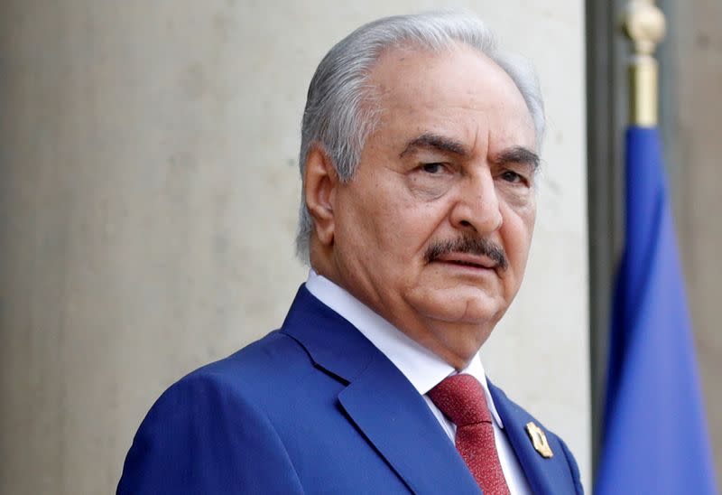 FILE PHOTO: Khalifa Haftar, the military commander who dominates eastern Libya, arrives to attend an international conference on Libya at the Elysee Palace in Paris