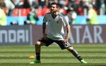 <p>Lionel Messi warms up as he looks to measure up to Ronaldo’s Friday night performance </p>