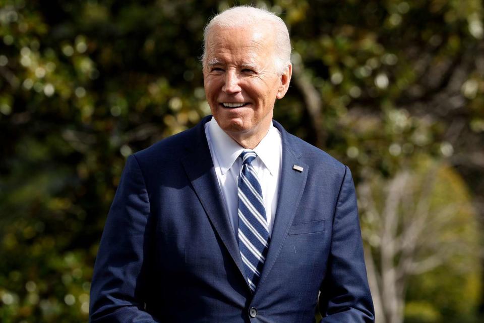 <p>Anna Moneymaker/Getty </p> President Joe Biden talks to members of media before departing the White House for East Palestine, Ohio, on Feb. 16, 2024