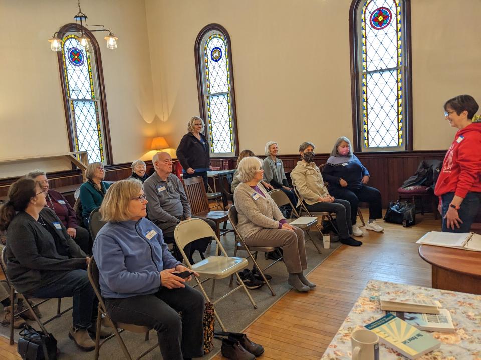 Lisa Hochgraf leads a Feldenkrais method session at the 2023 Day of Curiosity. This year's Chautauqua-style event will be Feb. 4 at the West Bloomfield United Church of Christ.