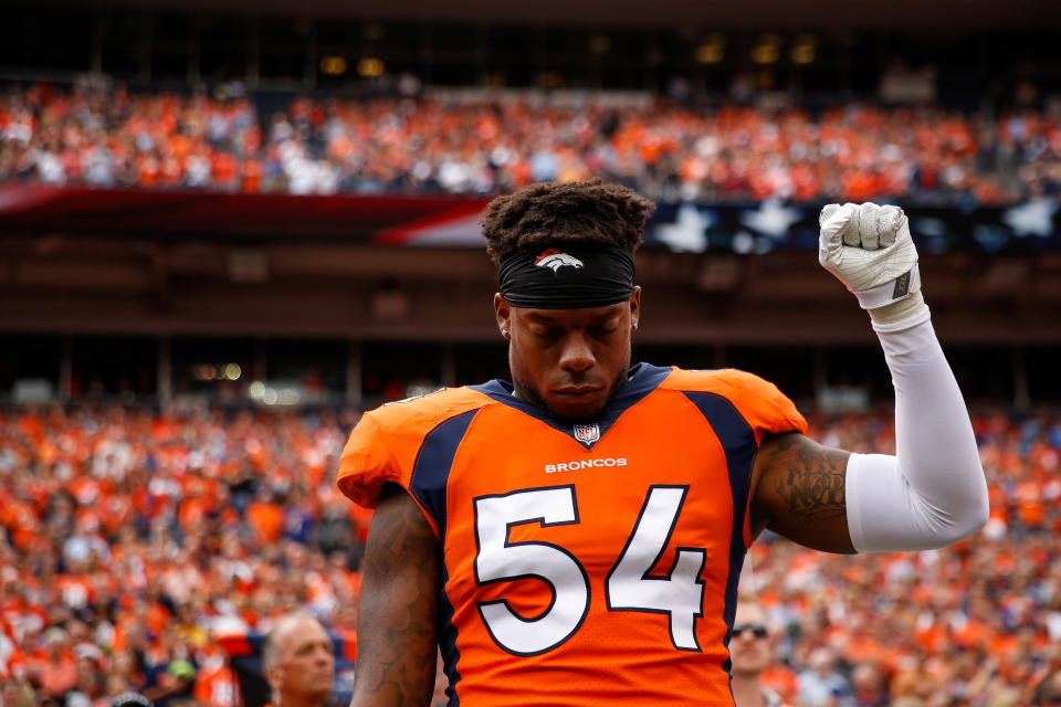 <p>Inside linebacker Brandon Marshall #54 of the Denver Broncos stands and holds a fist in the air during the national anthem before a game against the Oakland Raiders at Sports Authority Field at Mile High on October 1, 2017 in Denver, Colorado. (Photo by Justin Edmonds/Getty Images) </p>