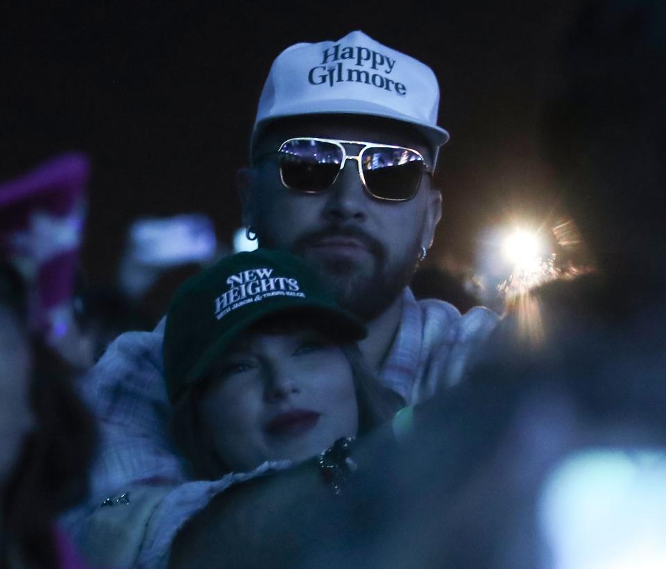 Taylor Swift and Travis KeIce watch as Spice performs in the Mojave tent at the Coachella Valley Music and Arts Festival in Indio, Calif., April 13, 2024.