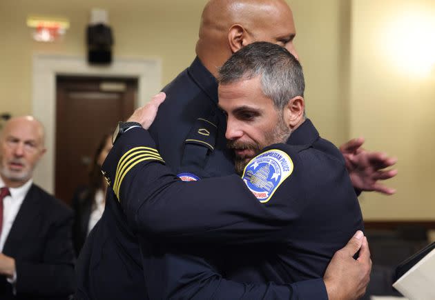 Officer Harry Dunn and Officer Michael Fanone embrace. (Photo: JIM LO SCALZO via Getty Images)