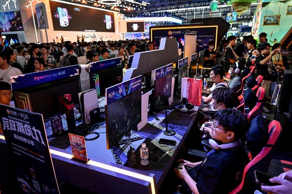 People play esports games at the China Digital Entertainment Expo & Conference, known as ChinaJoy, which has been held for 20 years, in Shanghai on July 28, 2023.