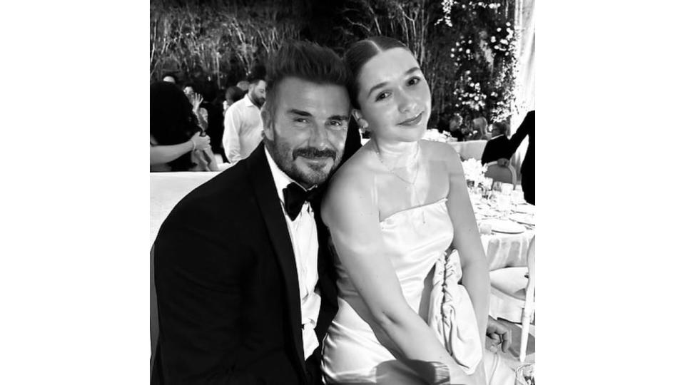 David Beckham and his daughter Harper at a wedding