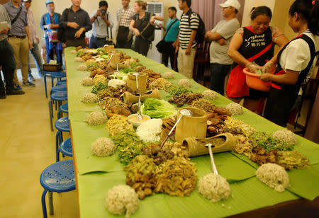 Wa's information department display lunch for media who visit their territory at Panghsang capital city of ethnic Wa territory in northeast Myanmar October 2, 2016. REUTERS/Soe Zeya Tun