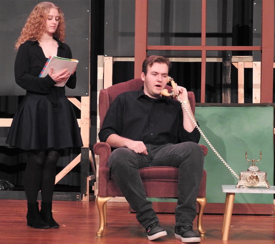 Samantha McCarthy as Grace and Matthew Cullison as Daddy Warbucks rehearse a scene from "Annie" opening at River View High School. Cullison is to be on the phone with President Franklin D. Roosevelt and the students are learning history through the show as it's set in the Great Depression.