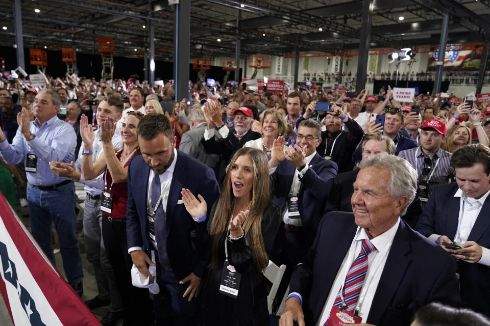 Supporters cheer as President Donald Trump speaks at a rally at Xtreme Manufacturing, Sunday, Sept. 13, 2020, in Henderson, Nev. (AP Photo/Andrew Harnik)