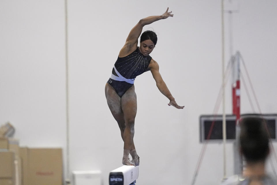 Gabby Douglas competes on the balance beam at the American Classic Saturday, April 27, 2024, in Katy, Texas. (AP Photo/David J. Phillip)